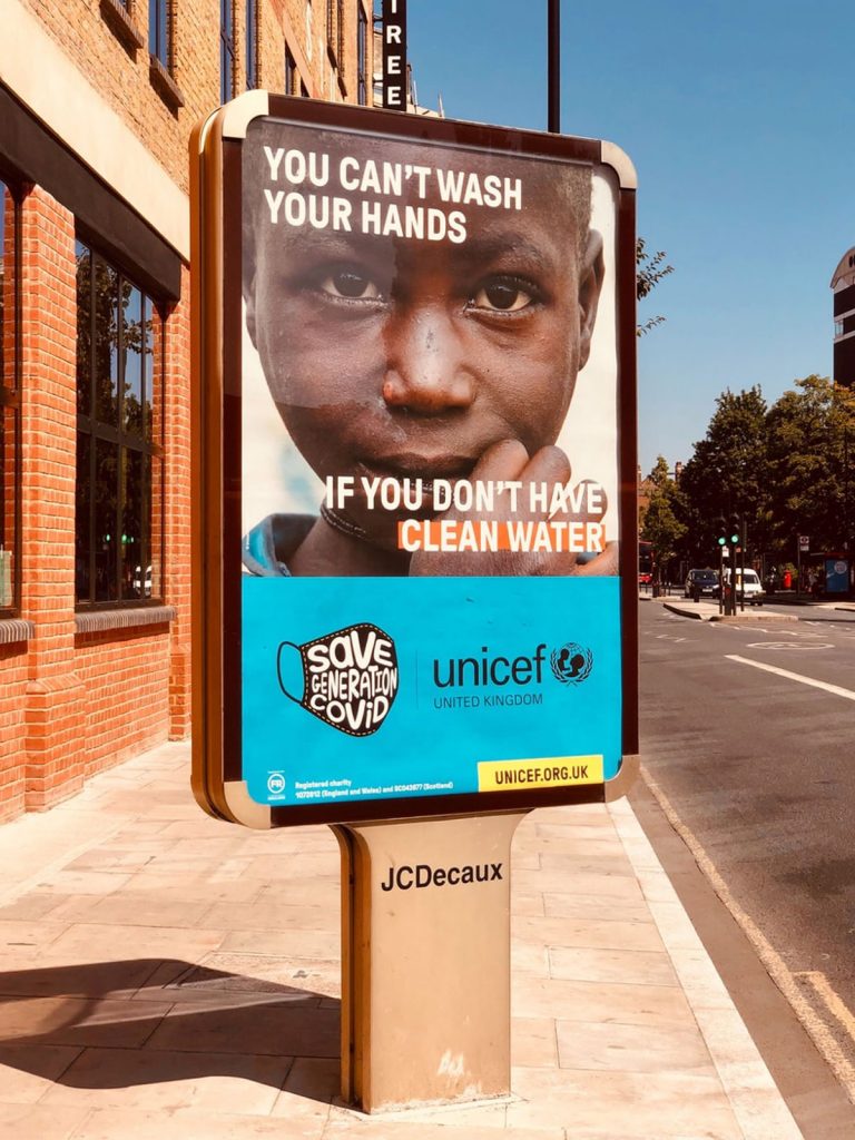 A photo of a street sign advertising Unicef's advert promoting clean water
